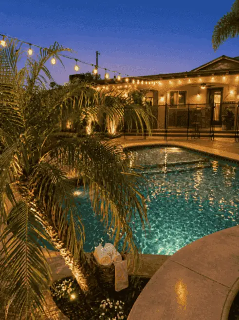 Pool area in the evening with exterior lighting