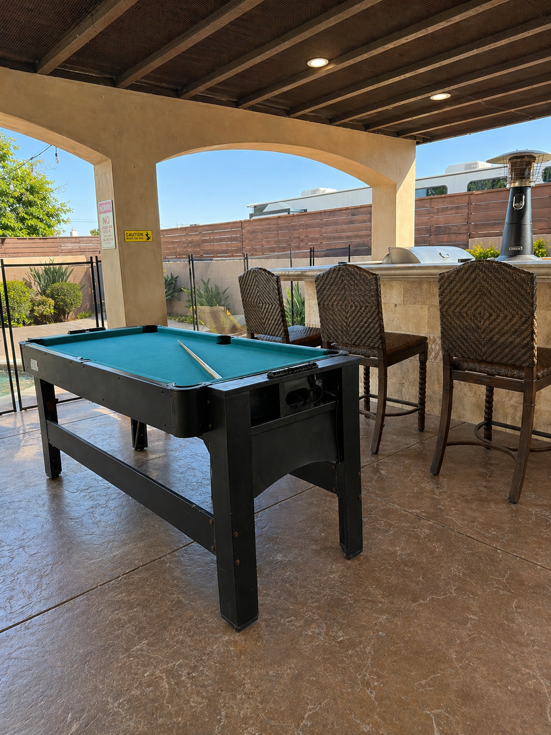 Covered recreation area with pool table
