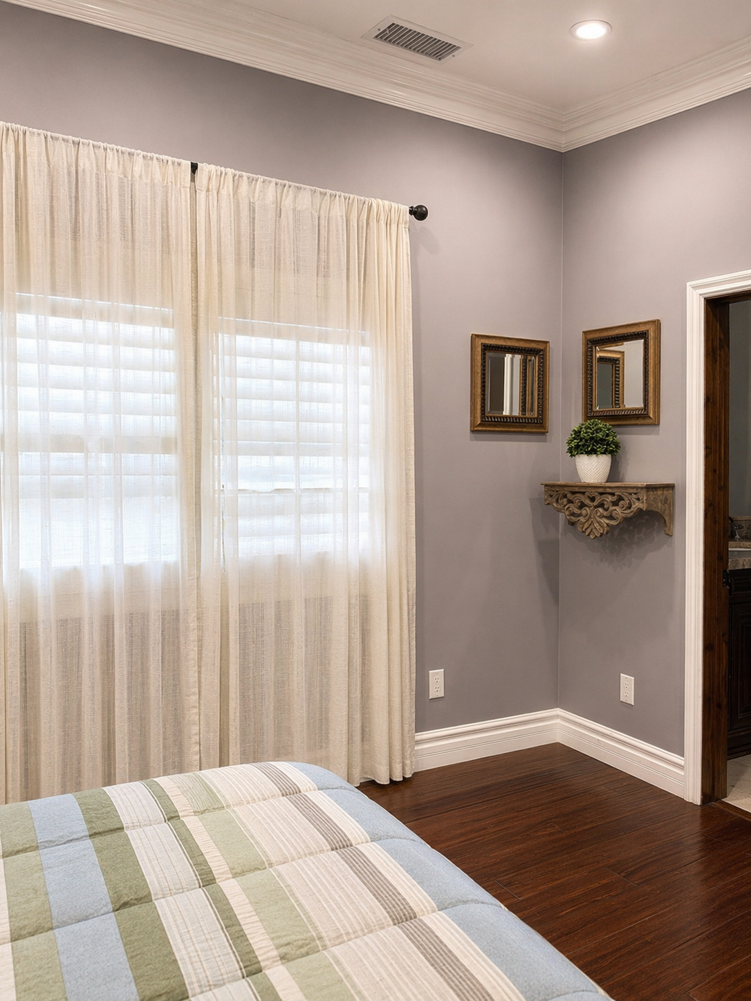 Bedroom with window seating and soft natural light